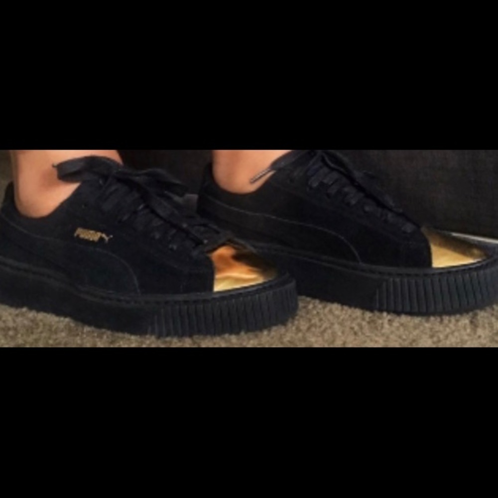 Rihanna black gold pumas